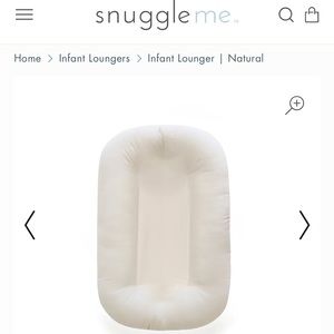 Snuggle Me Organic Lounger plus two pillow cases for it.